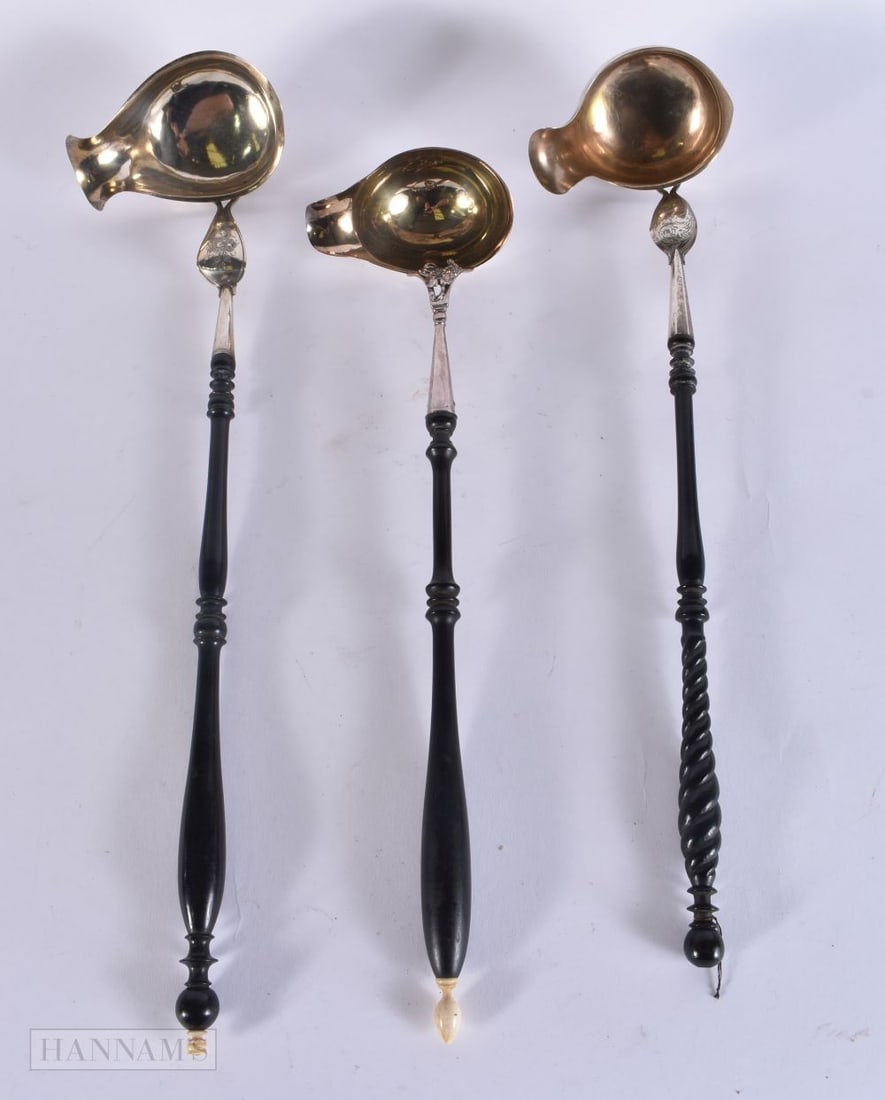 THREE ANTIQUE CONTINENTAL SILVER LADLES. 35 cm long. (3) (1 of 3)