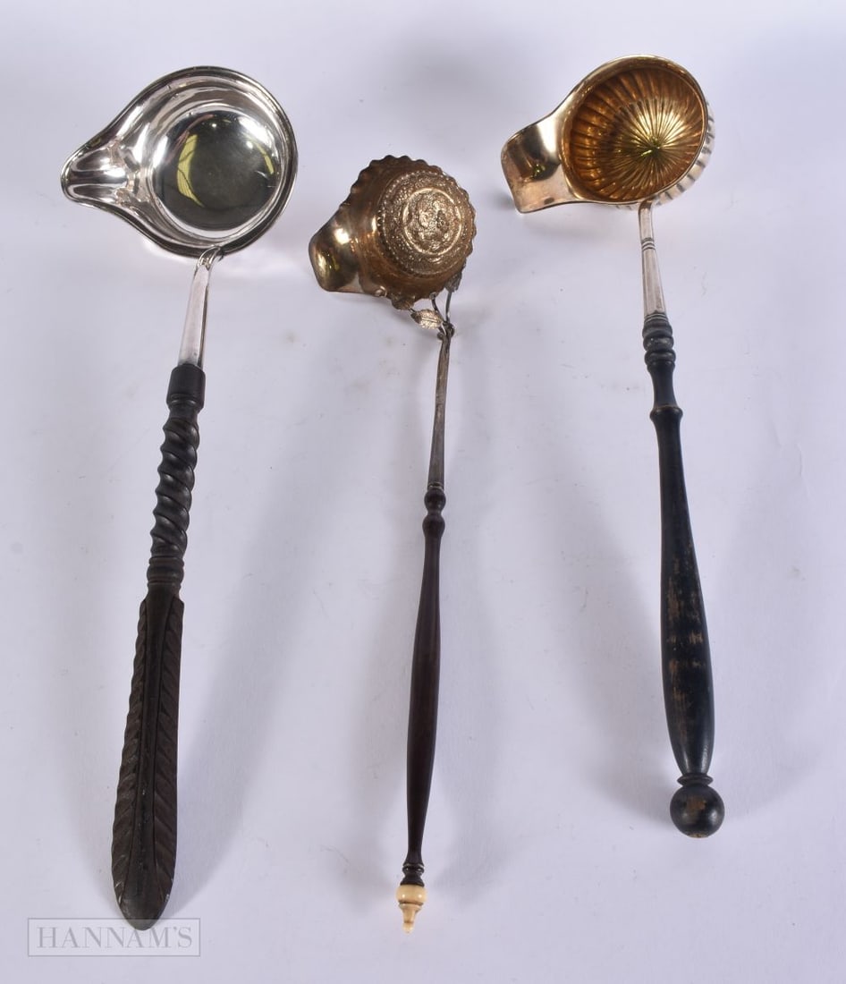 THREE ANTIQUE CONTINENTAL SILVER LADLES. 35 cm long. (3) (1 of 3)