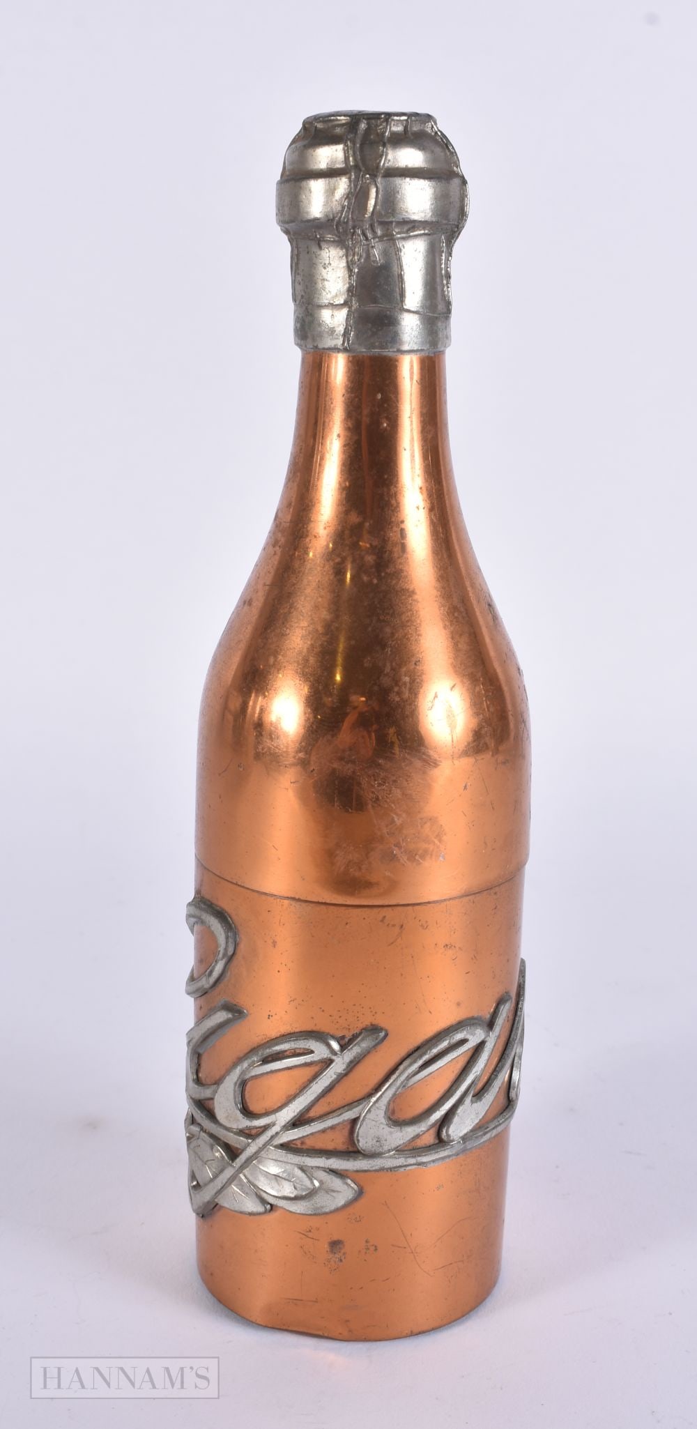 A VINTAGE COPPER MINIATURE CHAMPAGNE BOTTLE. 24 cm high.: A VINTAGE COPPER MINIATURE CHAMPAGNE BOTTLE. 24 cm high.