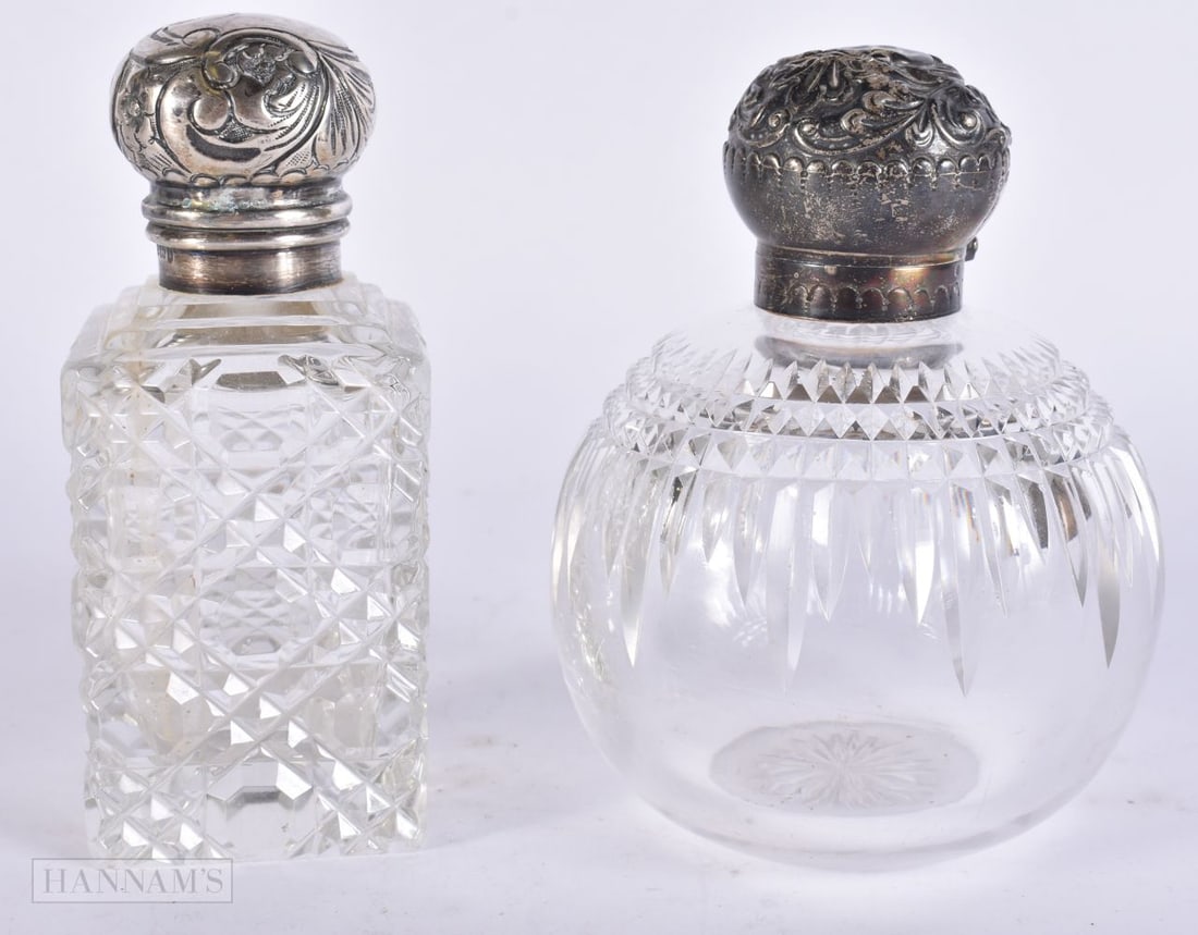 TWO ANTIQUE SILVER MOUNTED CUT GLASS BOTTLES. 14 cm high. (2) (1 of 6)