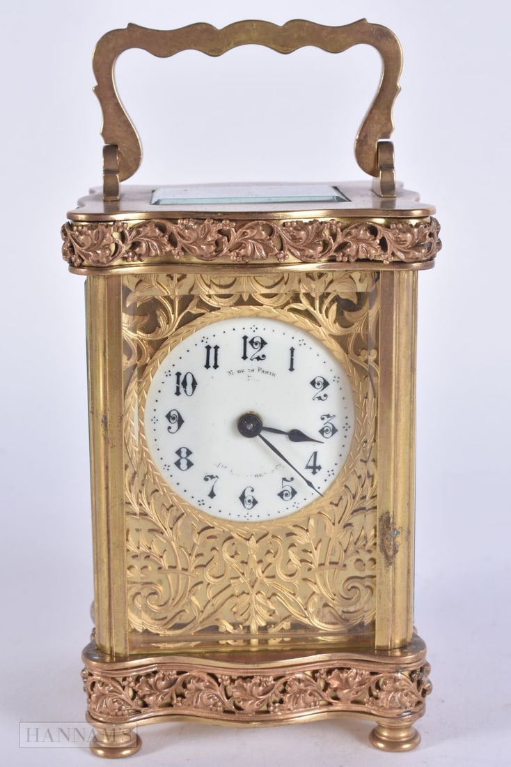 AN ANTIQUE REPEATING BRASS CARRIAGE CLOCK. 15.5 cm high inc handle. (1 of 7)