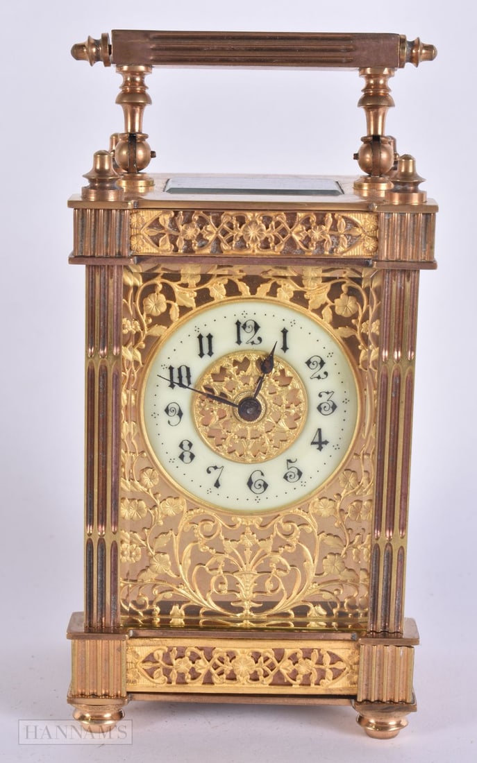 AN ANTIQUE RETICULATED FILIGREE CARRIAGE CLOCK. 15 cm high inc handle. (1 of 7)
