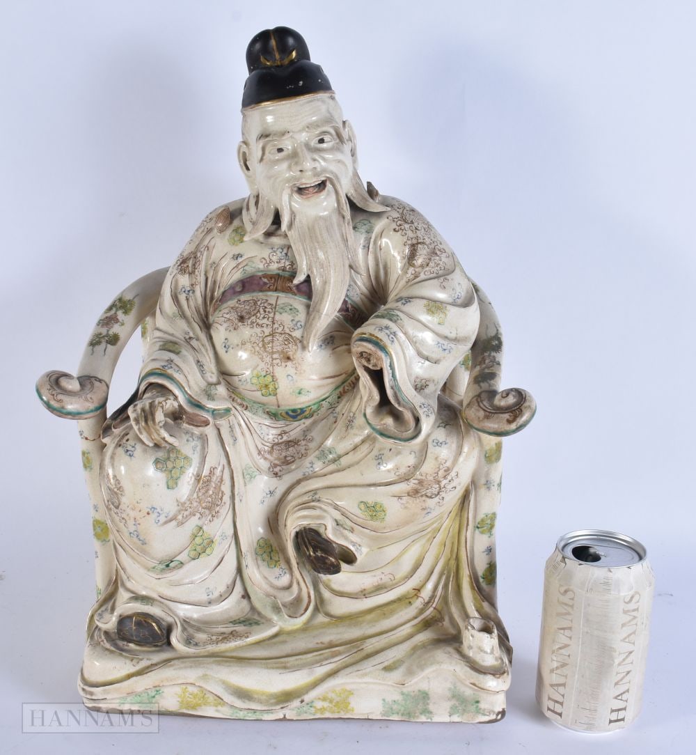 A LARGE 19TH CENTURY JAPANESE MEIJI PERIOD SATSUMA FIGURE modelled seated upon a chair. 42 cm x 26 c (1 of 9)