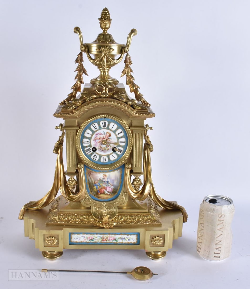 A 19TH CENTURY FRENCH SEVRES PORCELAIN BRONZE MANTEL CLOCK painted with lovers in a landscape. 45 cm (1 of 7)