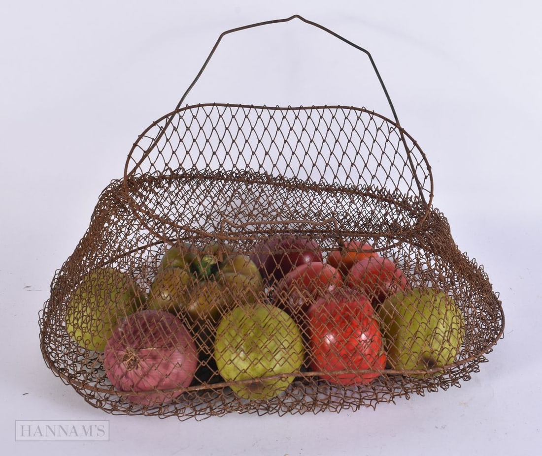 A VINTAGE FISHING REEL containing faux fruit. reel 48 cm x 28 cm extended. (qty): A VINTAGE FISHING REEL containing faux fruit. reel 48 cm x 28 cm extended. (qty)