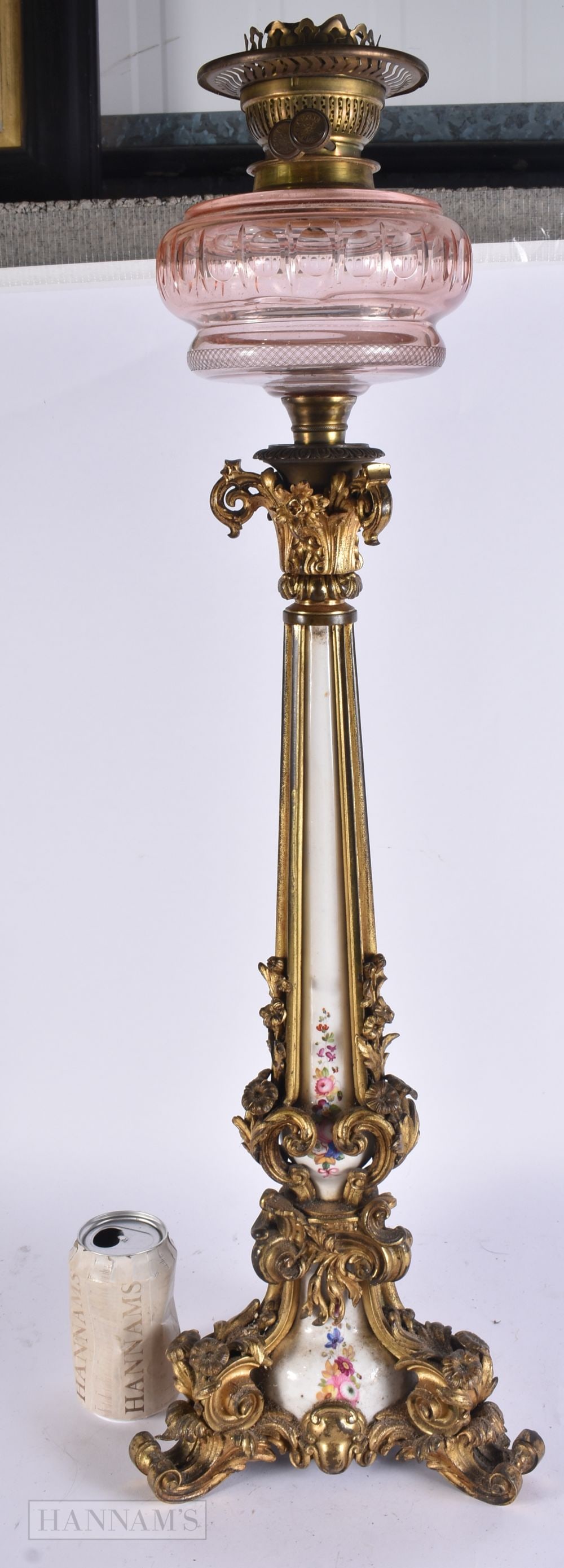 A LARGE 19TH CENTURY GILT BRONZE AND CERAMIC OIL LAMP. 78 cm high.: A LARGE 19TH CENTURY GILT BRONZE AND CERAMIC OIL LAMP. 78 cm high.