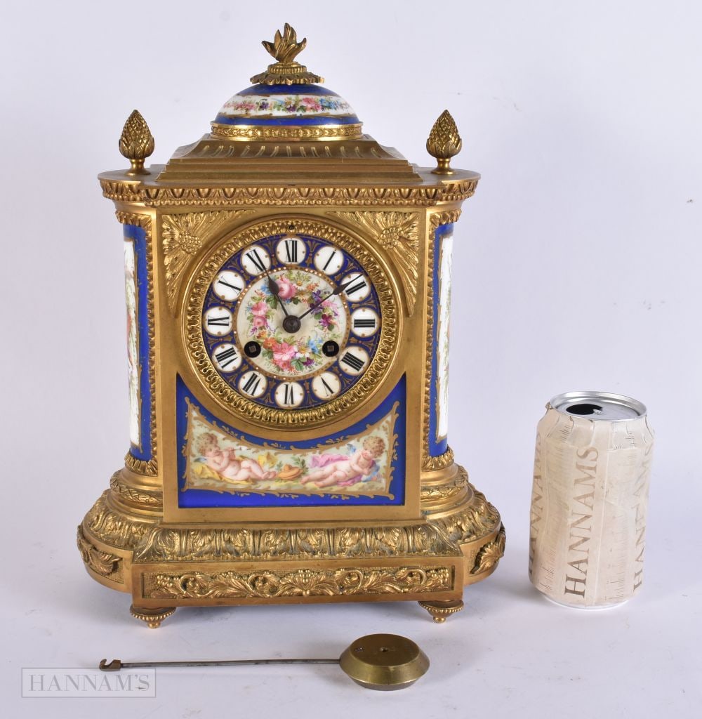 A 19TH CENTURY FRENCH SEVRES PORCELAIN AND GILT BRONZE MANTEL CLOCK. 32 cm x 26 cm.: A 19TH CENTURY FRENCH SEVRES PORCELAIN AND GILT BRONZE MANTEL CLOCK. 32 cm x 26 cm.