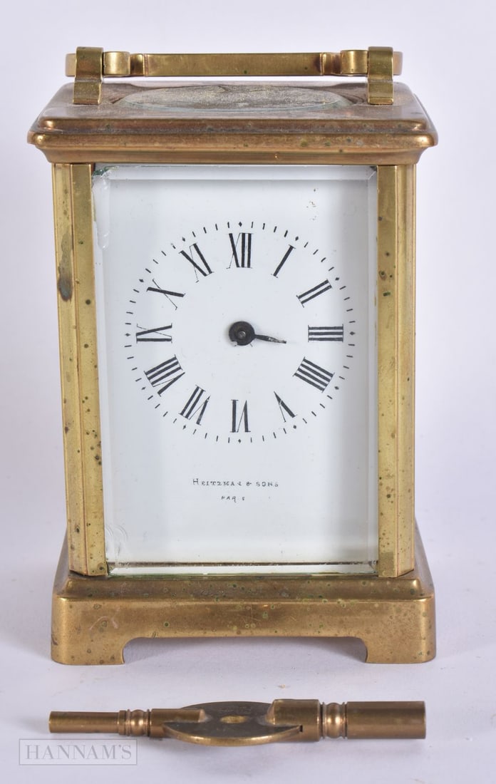 AN ANTIQUE CARRIAGE CLOCK. Running. 13.5 cm high. (1 of 7)