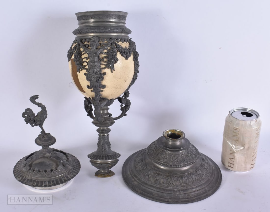 AN ANTIQUE PEWTER MOUNTED OSTRICH EGG VASE AND COVER. 45 cm high.: AN ANTIQUE PEWTER MOUNTED OSTRICH EGG VASE AND COVER. 45 cm high.