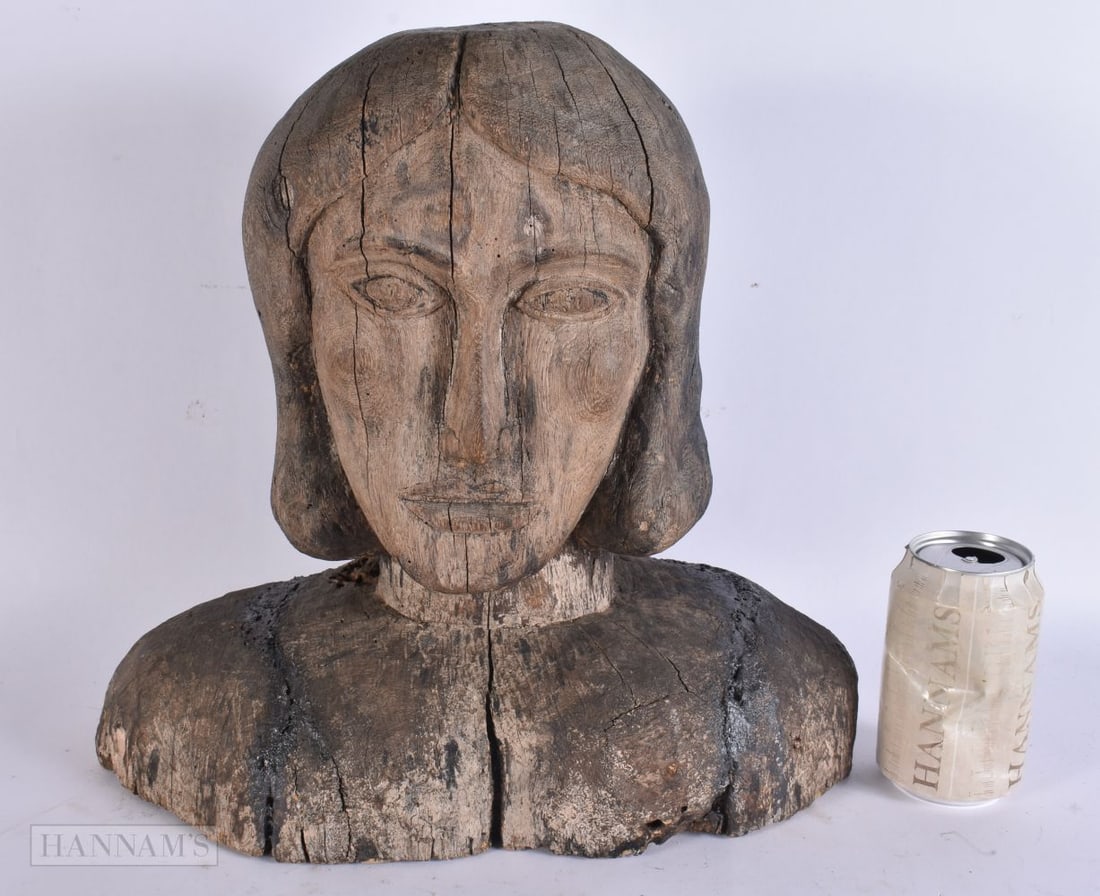 AN ANTIQUE CARVED FOLK ART WOOD BUST OF A MALE. 34 cm x 34 cm x 16 cm.: AN ANTIQUE CARVED FOLK ART WOOD BUST OF A MALE. 34 cm x 34 cm x 16 cm.