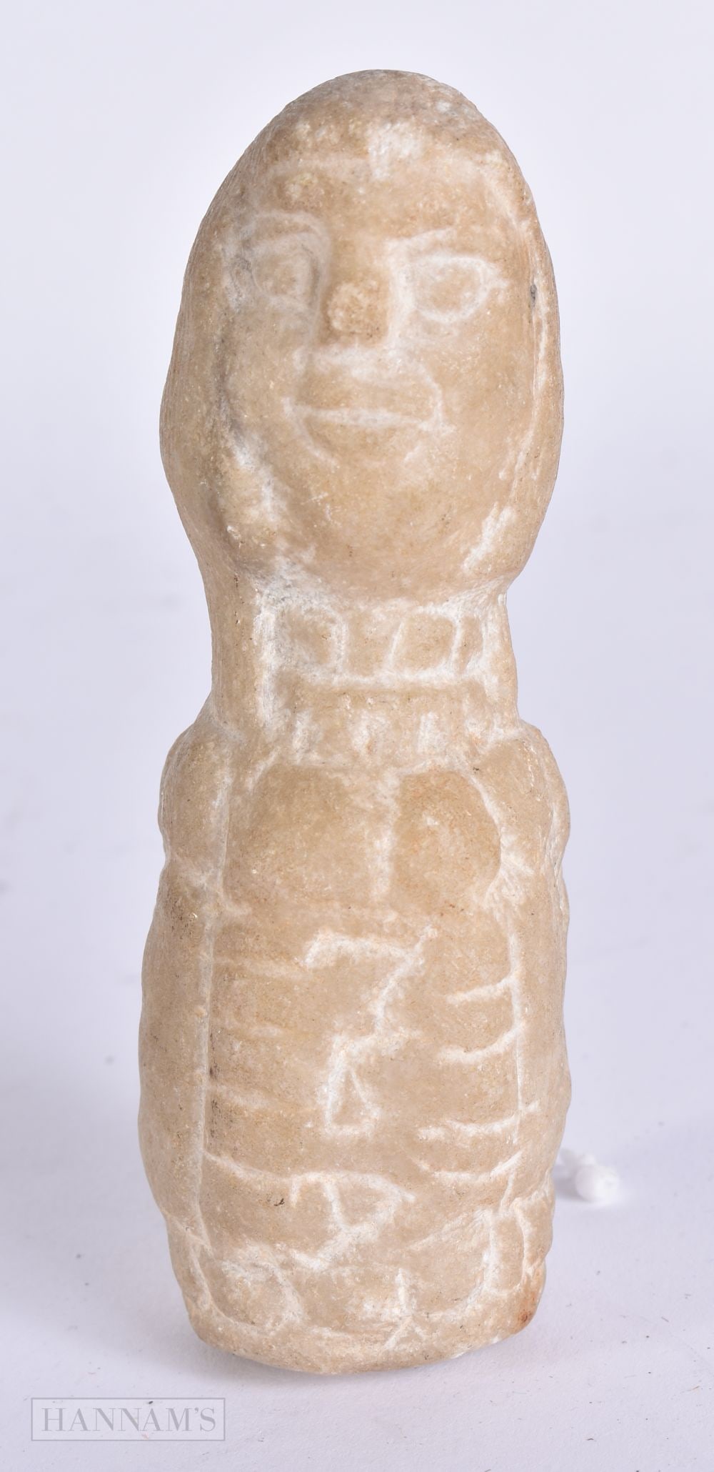 AN EARLY MIDDLE EASTERN CARVED STONE IDOL. 10 cm high. (1 of 5)