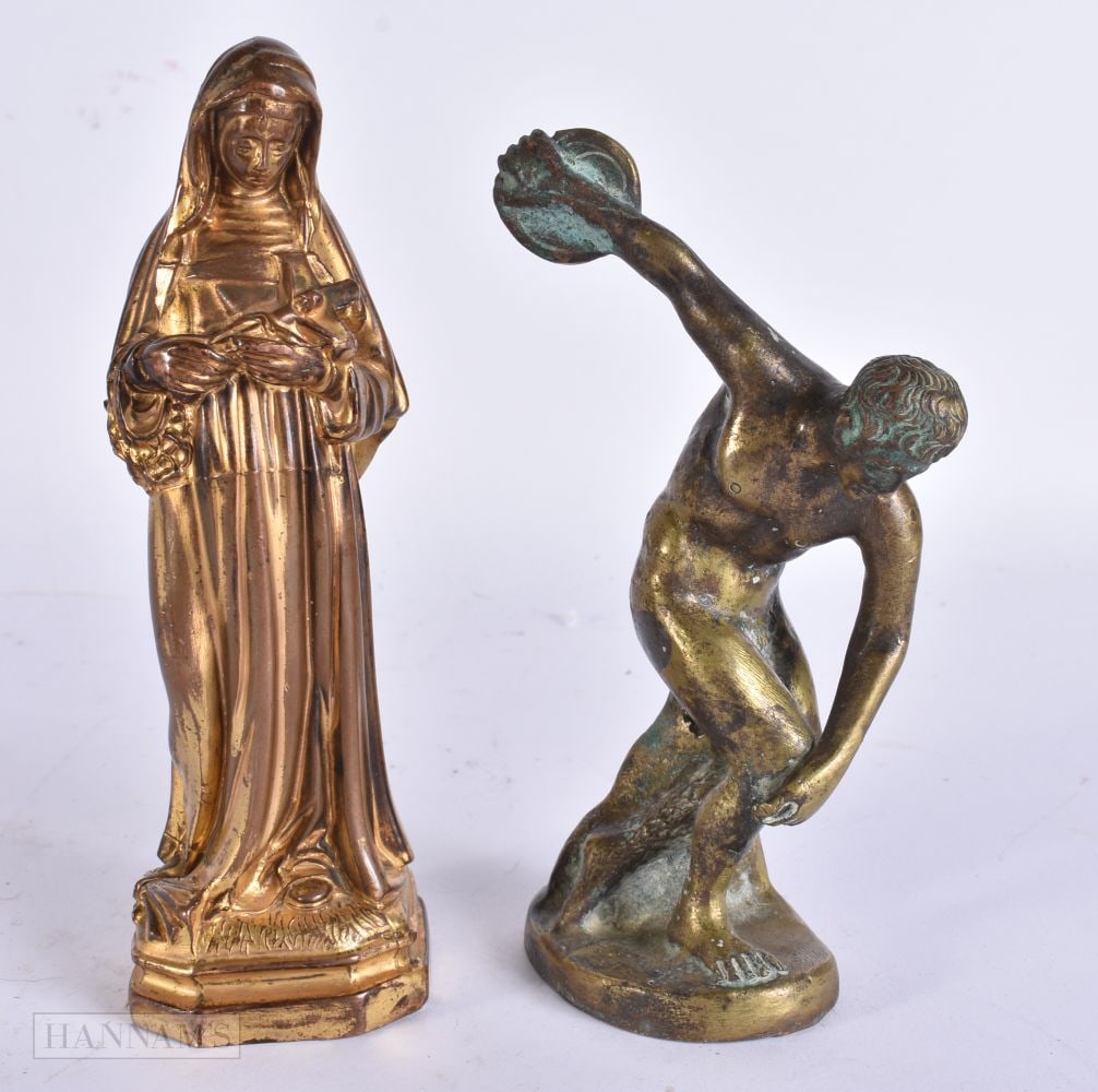 AN ANTIQUE GRAND TOUR BRONZE FIGURE OF A DISCUS THROWER together with a saint. Largest 15 cm high. (: AN ANTIQUE GRAND TOUR BRONZE FIGURE OF A DISCUS THROWER together with a saint. Largest 15 cm high. (2)