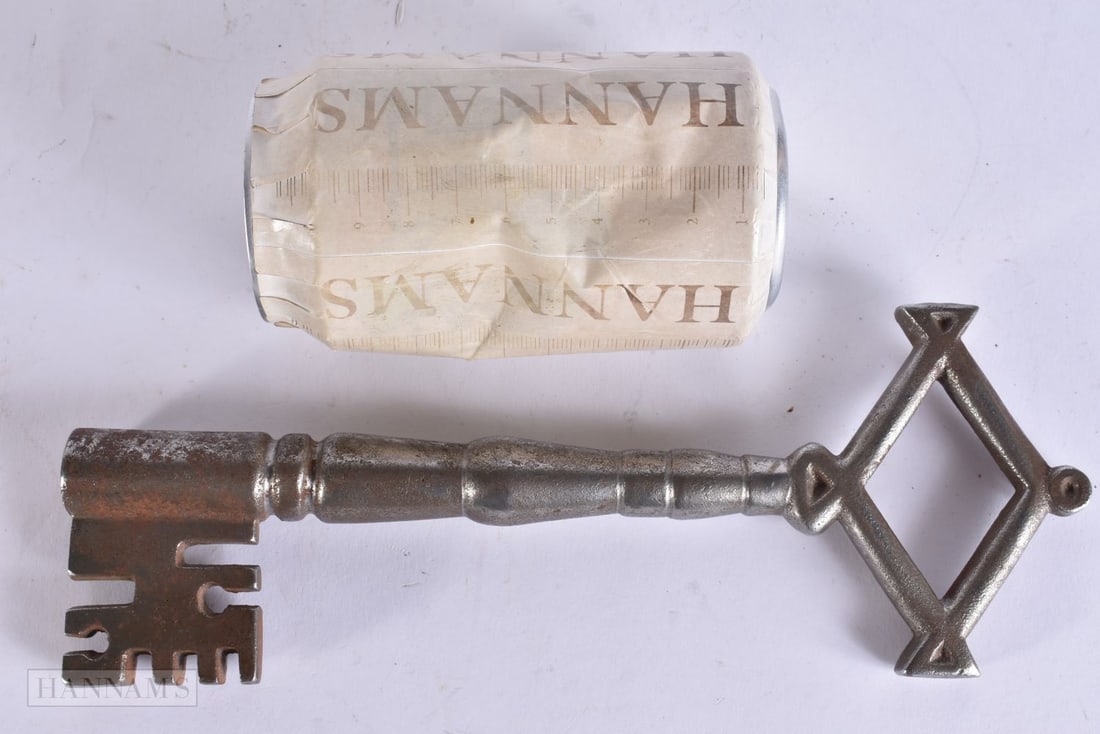 A LARGE ANTIQUE KEY with lozenge terminal. 23.5 cm x 9 cm. (1 of 4)