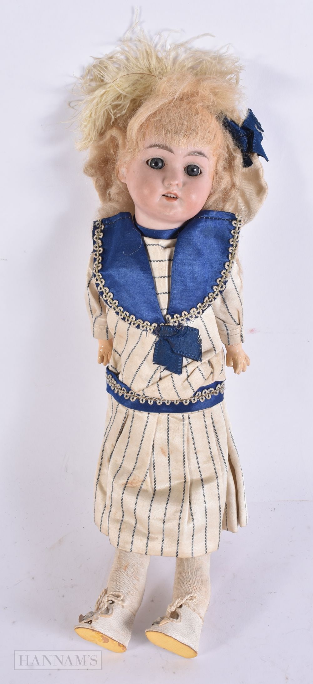 AN ANTIQUE BISQUE HEAD PORCELAIN DOLL. 36 cm high. (1 of 5)