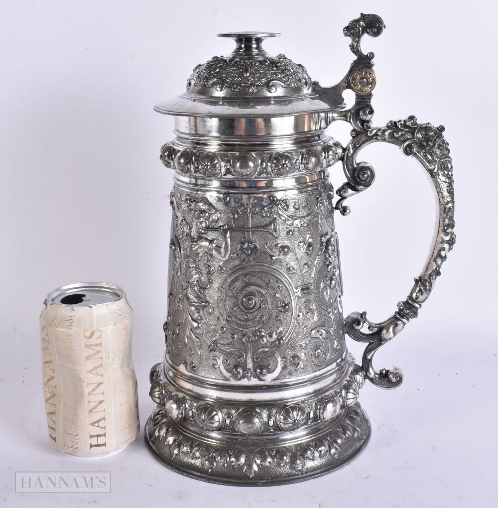 AN UNUSUAL ANTIQUE WMF SILVER PLATED REPOUSSE TANKARD. 30 cm x 16 cm. (1 of 9)