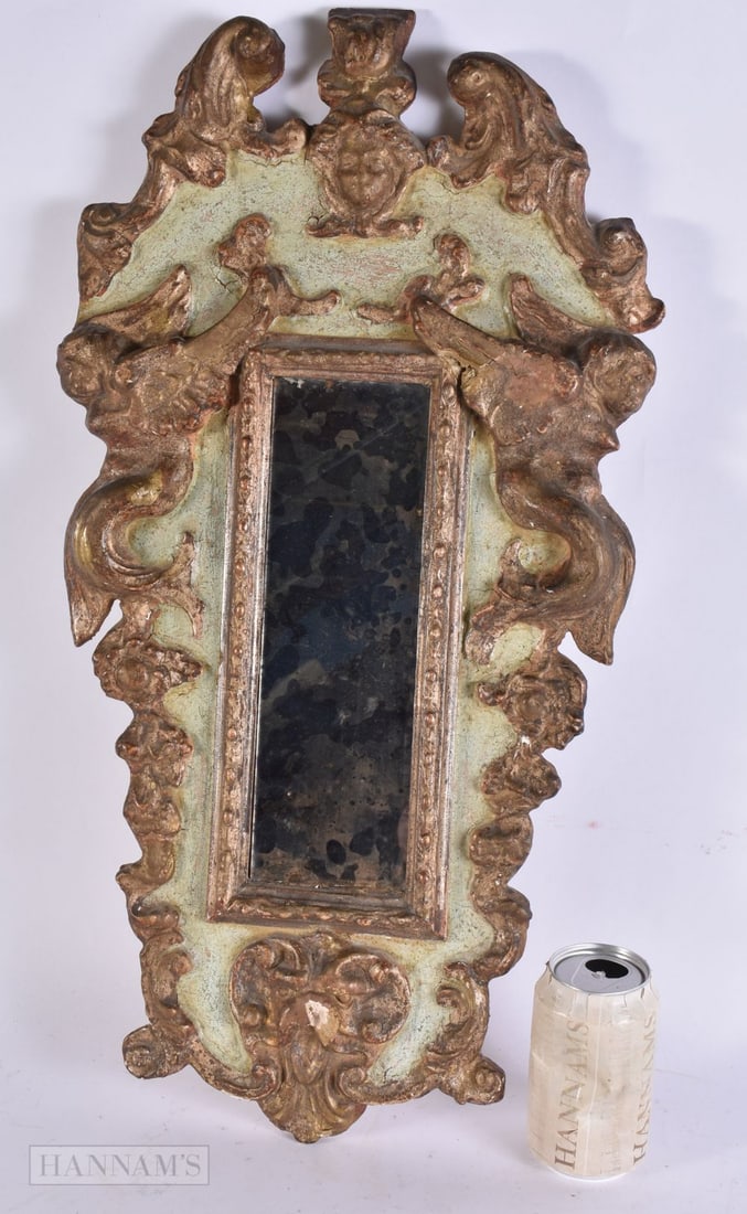 AN EARLY 18TH CENTURY CONTINENTAL GILTWOOD MIRROR of classical form. 60 cm x 25 cm. (1 of 5)