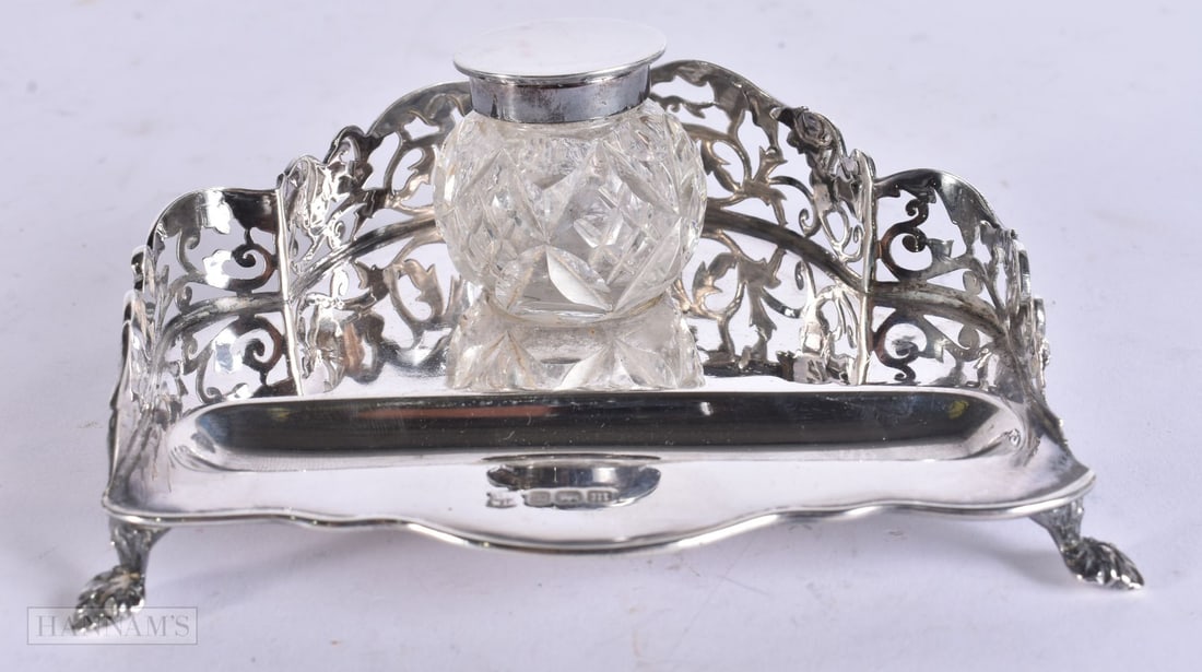 AN EDWARDIAN SILVER INKWELL of reticulated form. Weighable silver 93 grams. 12 cm wide. (1 of 6)