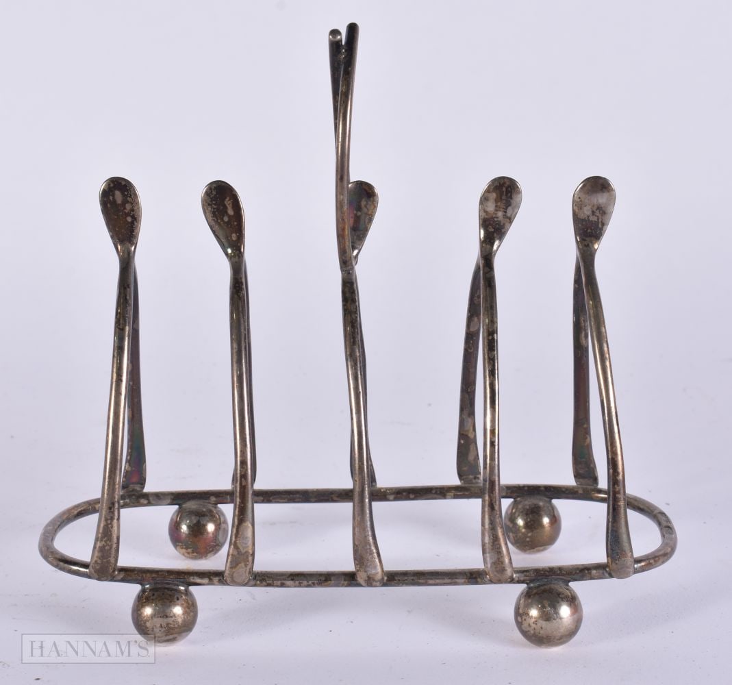 AN EDWARDIAN SILVER WISHBONE TOAST RACK. 115 grams. 14 cm x 12 cm. (1 of 5)