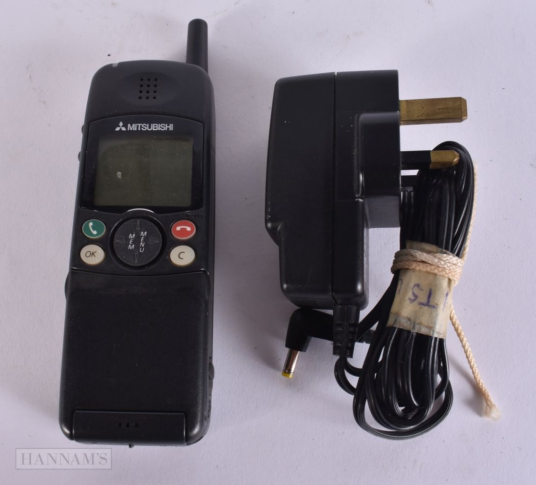 A VINTAGE MITSUBISHI MOBILE PHONE. (qty) (1 of 4)