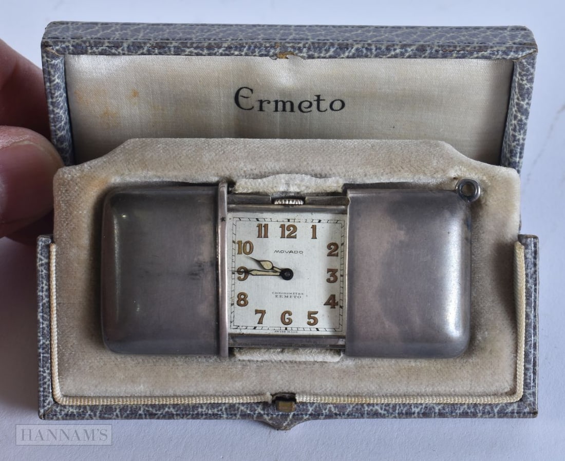 AN ART DECO SILVER MOVADO WATCH. Working. 59 grams. 7 cm x 3 cm. (1 of 4)