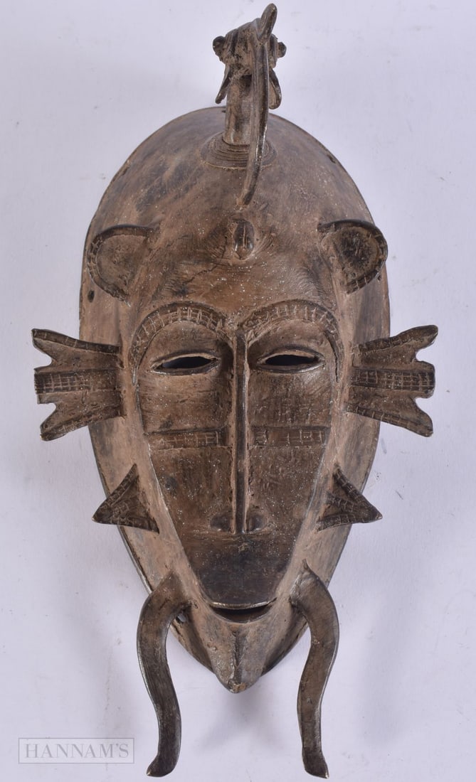 AN AFRICAN BENIN BRONZE MASK. 24 cm long. (1 of 4)