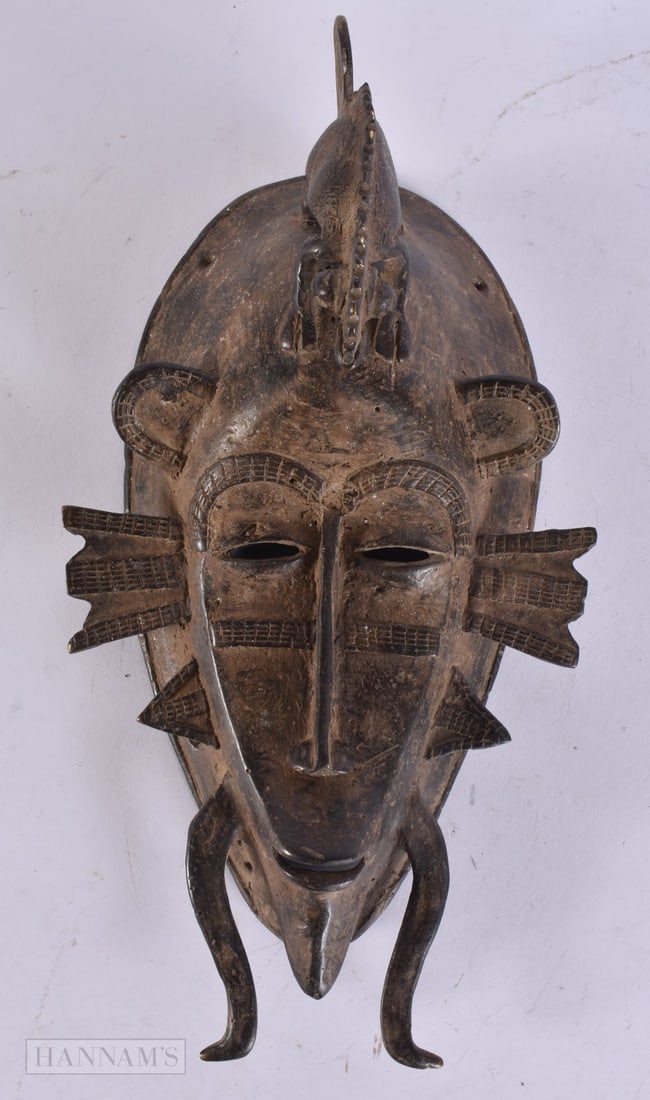 AN AFRICAN BENIN BRONZE MASK. 24 cm long. (1 of 4)