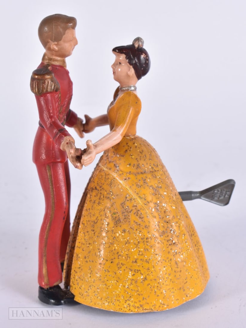 A VINTAGE MINIC WIND UP DANCING COUPLE. 13 cm high. (1 of 5)
