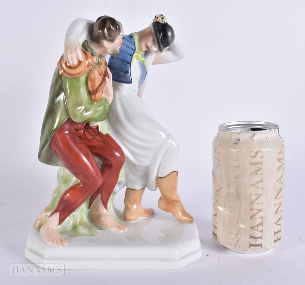 A HUNGARIAN HEREND PORCELAIN FIGURAL GROUP depicting the musician and the drunken male. 23 cm x 12 c (1 of 6)
