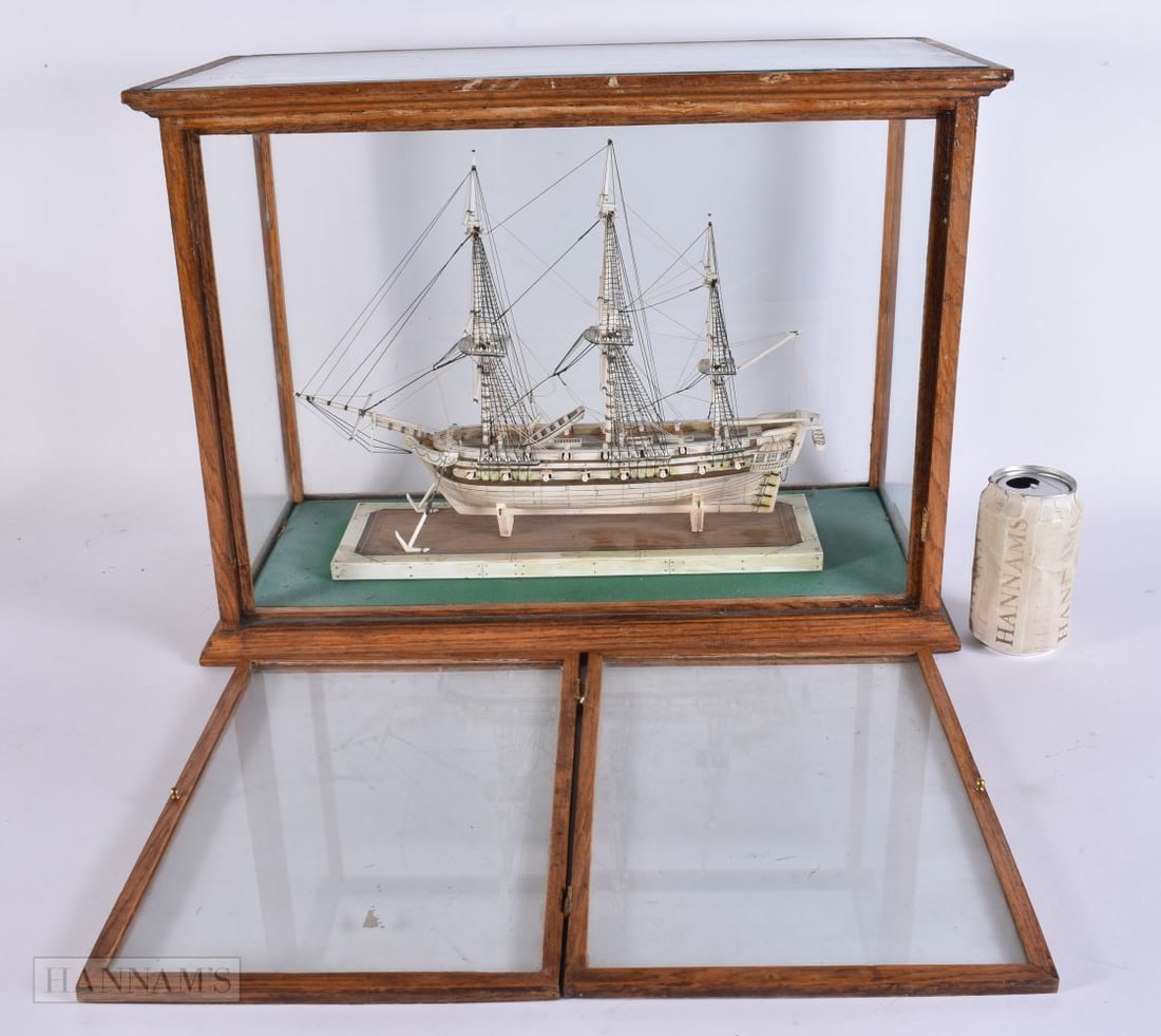 A LOVELY 19TH CENTURY NAPOLEONIC PRISONER OF WAR BONE BOAT contained within a late Victorian oak dis (1 of 8)