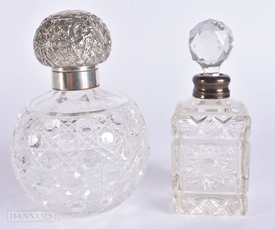 TWO ANTIQUE SILVER MOUNTED SCENT BOTTLES. 14 cm high. (1 of 5)