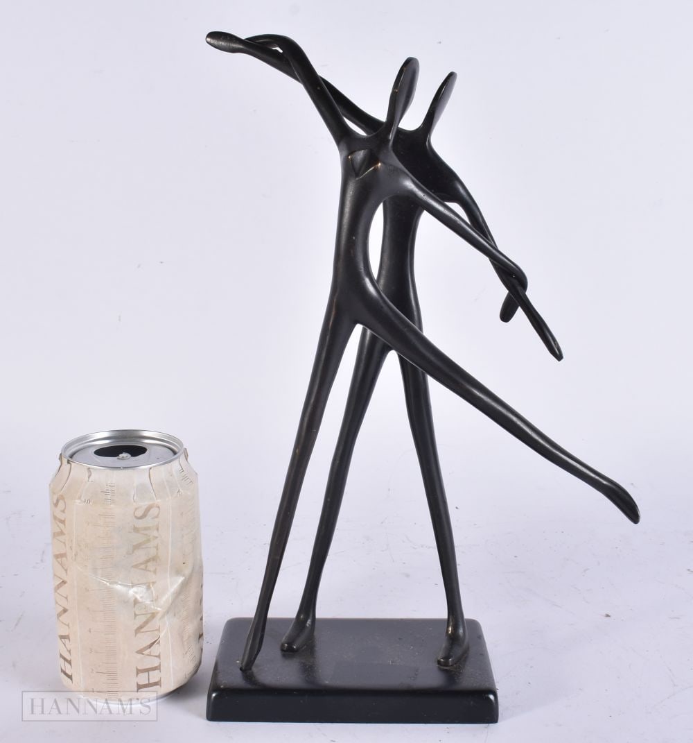 AN ABSTRACT BRONZE SCULPTURE. 30 cm high. (1 of 4)