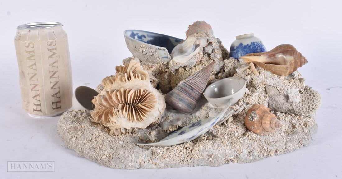 A CHINESE SHIPWRECK PORCELAIN SCULPTURE. 26 cm x 18 cm. (1 of 4)