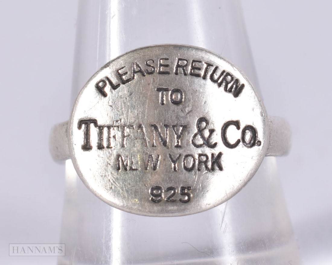 A TIFFANY & CO SILVER LOVE HEART RING. Q. 5.2 grams.: A TIFFANY & CO SILVER LOVE HEART RING. Q. 5.2 grams.
