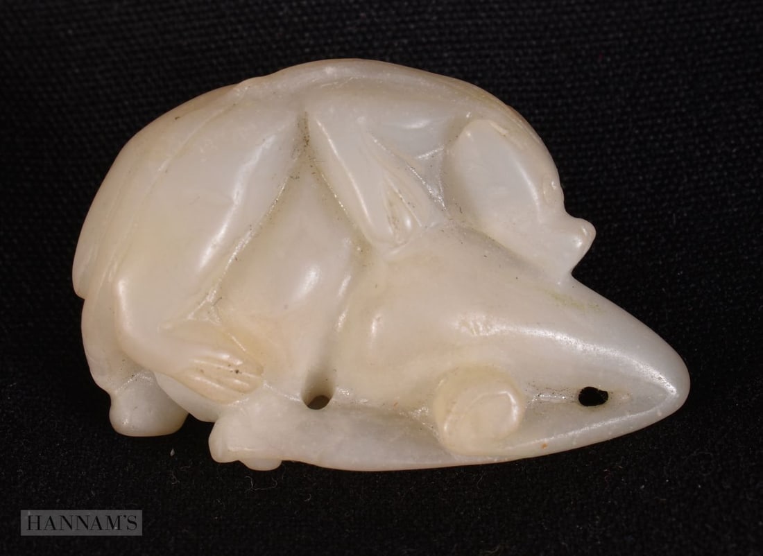 A 19TH CENTURY CHINESE WHITE JADE DRAGON AND FRUITING POD Late Qing. 4.5 cm x 3 cm.: A 19TH CENTURY CHINESE WHITE JADE DRAGON AND FRUITING POD Late Qing. 4.5 cm x 3 cm.