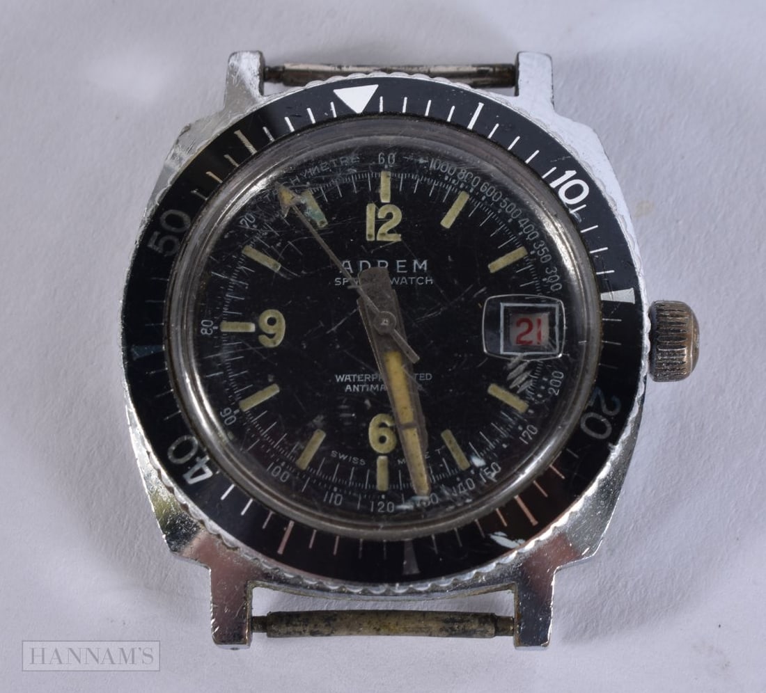 AN ARDEM BLACK DIAL WATCH. Running. 4 cm wide.: AN ARDEM BLACK DIAL WATCH. Running. 4 cm wide.