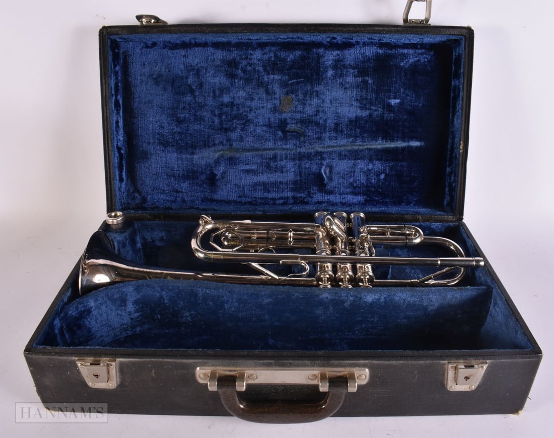 A 1960S BOOSEY & HAWKES SESSIONAIR TRUMPET. No LP 358143, the mouth piece stamped Vincent Bach Corp: A 1960S BOOSEY & HAWKES SESSIONAIR TRUMPET. No LP 358143, the mouth piece stamped Vincent Bach Corp 30. 48 cm wide.