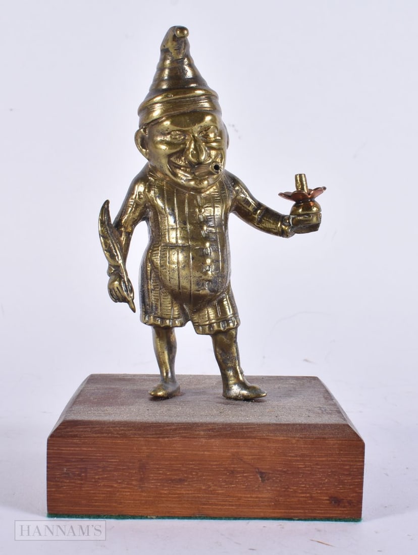 A VICTORIAN BRONZE PUNCH TABLE LIGHTER. 16.5 cm high. (1 of 5)