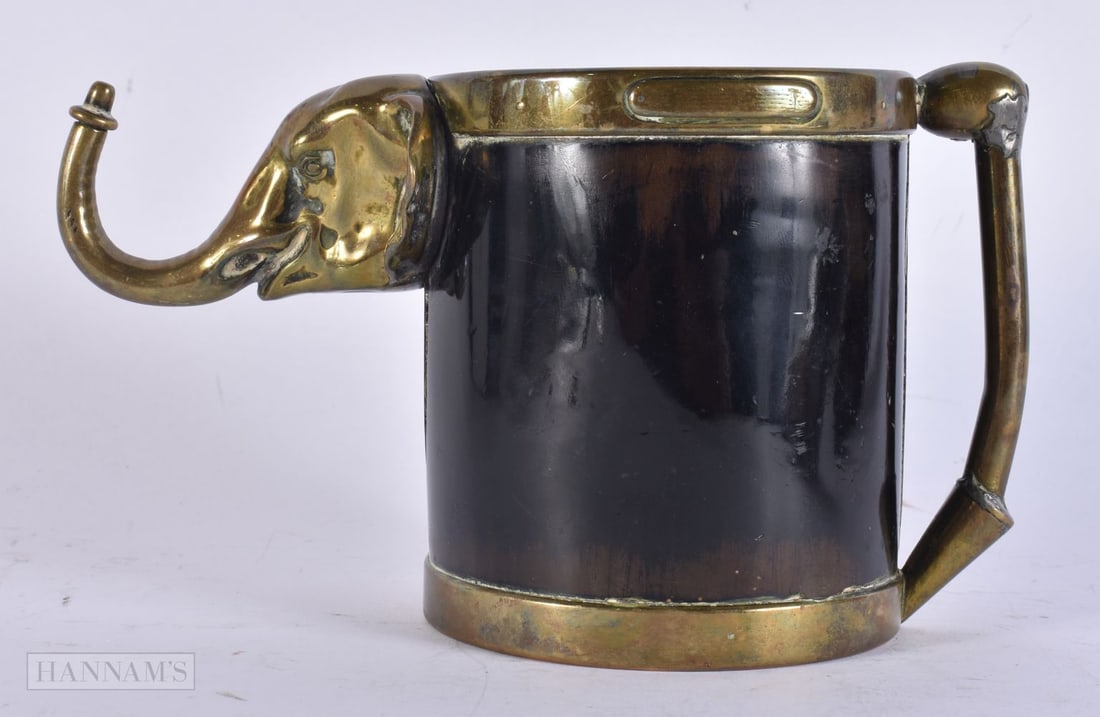 AN UNUSUAL EDWARDIAN BRONZE ELEPHANT TANKARD. 12 cm x 8 cm.: AN UNUSUAL EDWARDIAN BRONZE ELEPHANT TANKARD. 12 cm x 8 cm.