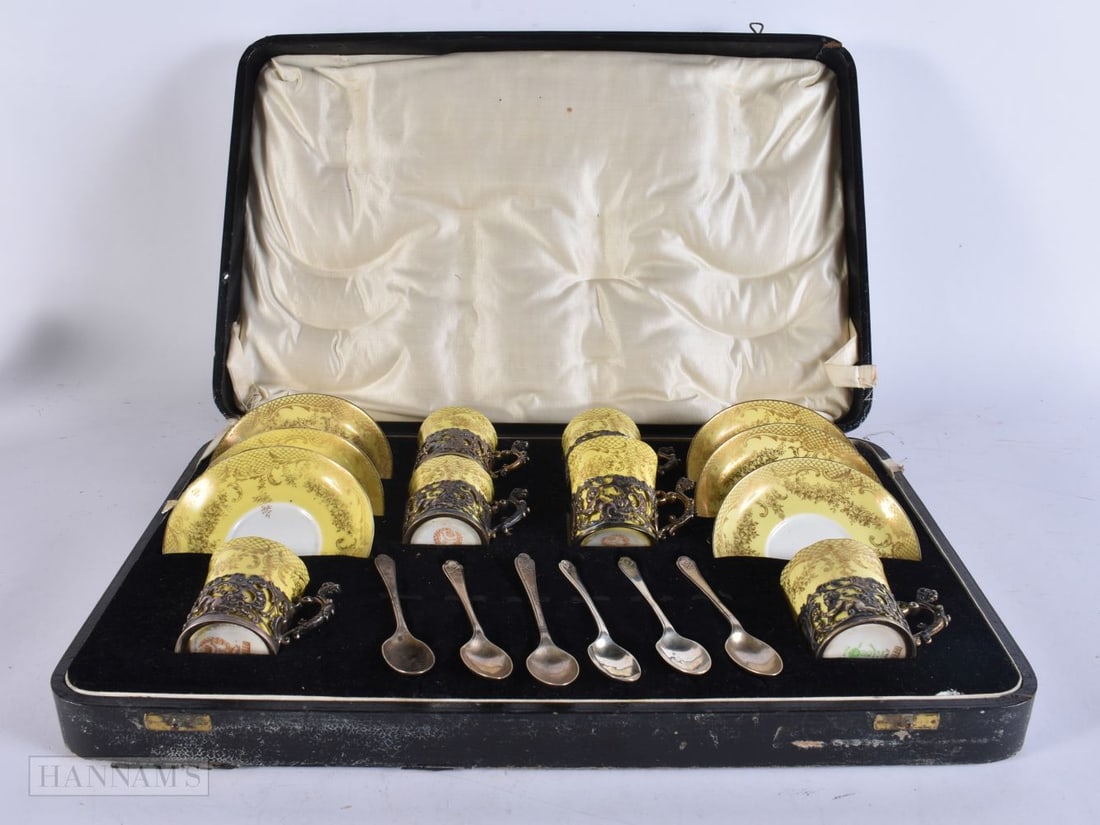 A CASED SILVER MOUNTED SET OF CROWN STAFFORDSHIRE CUPS AND SAUCERS. Silver 234 grams. 44 cm x 28 cm. (1 of 11)