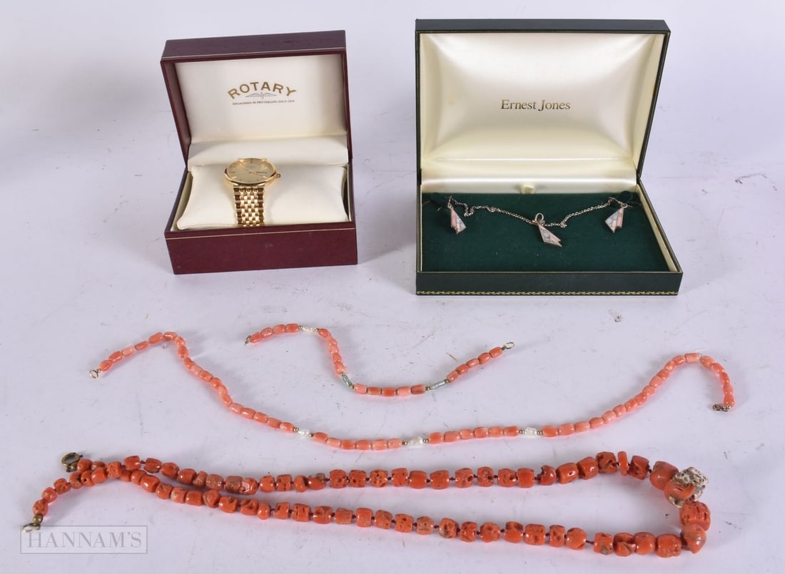 A ROTARY WRISTWATCH together with coral necklaces etc. (4): A ROTARY WRISTWATCH together with coral necklaces etc. (4)