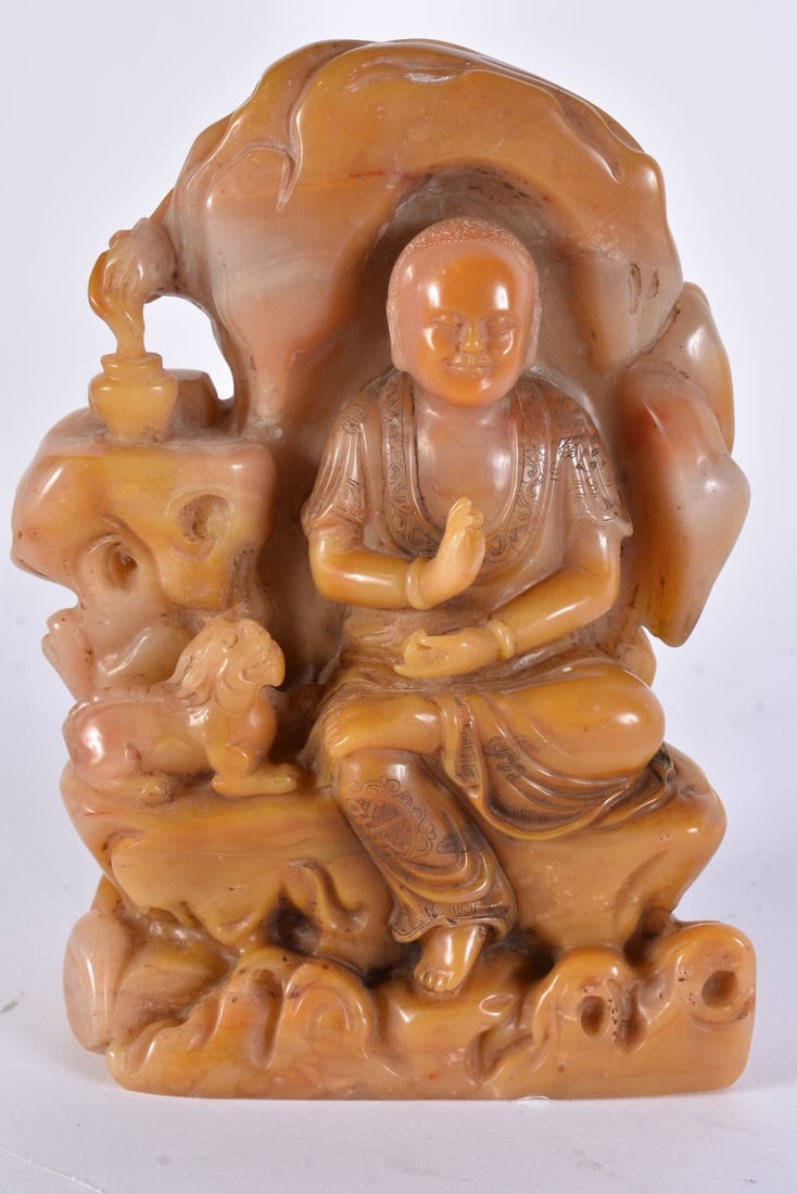 A CHINESE CARVED ORANGE SOAPSTONE SEAL. 16 cm x 8 cm.: A CHINESE CARVED ORANGE SOAPSTONE SEAL. 16 cm x 8 cm.