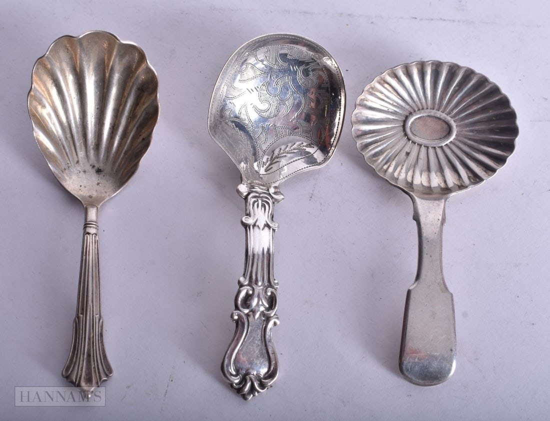 THREE ANTIQUE SILVER CADDY SPOONS. 38 grams. (3) (1 of 3)