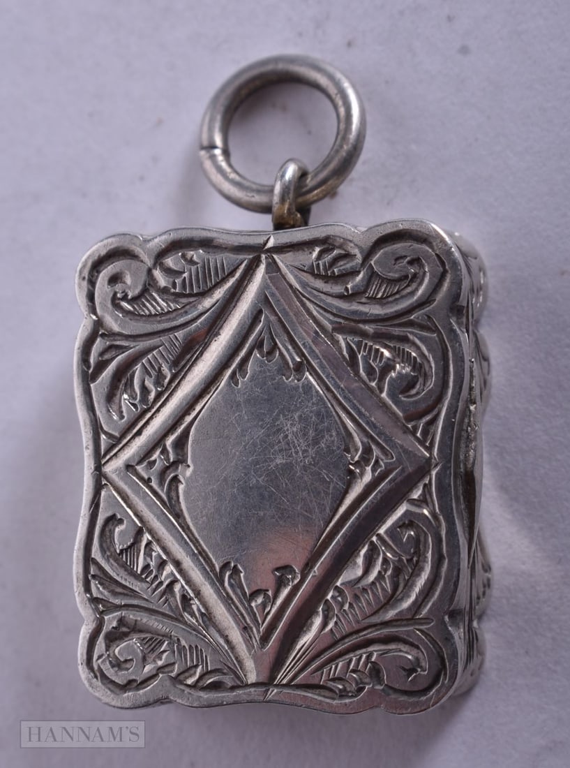 A VICTORIAN SILVER VINAIGRETTE. Birmingham 1868. 5 grams. 1.75 cm x 1.5 cm. (1 of 5)