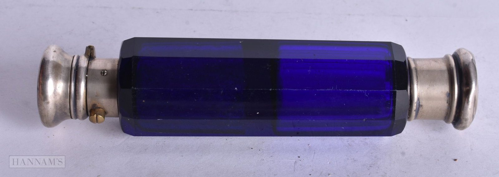 A VICTORIAN BLUE GLASS SCENT BOTTLE. 139 grams. 13.5 cm long. (1 of 3)