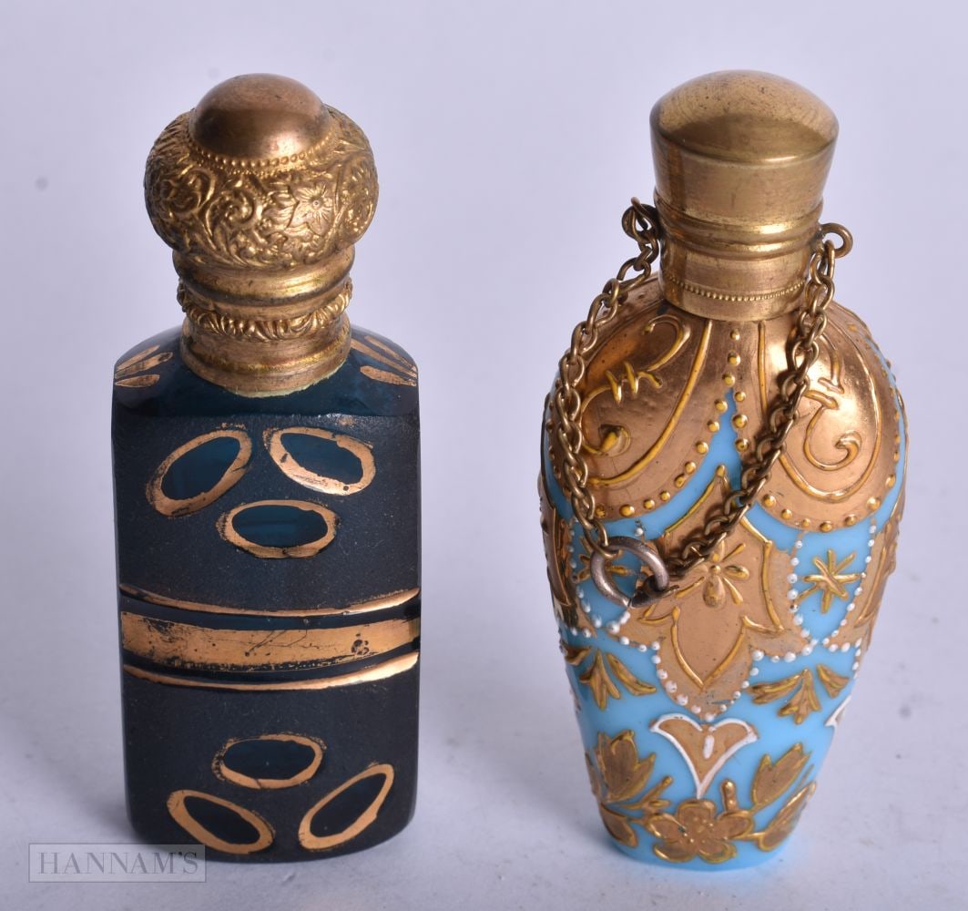 TWO EARLY 20TH CENTURY GLASS GILDED SCENT BOTTLES. 7.5 cm high. (2) (1 of 4)