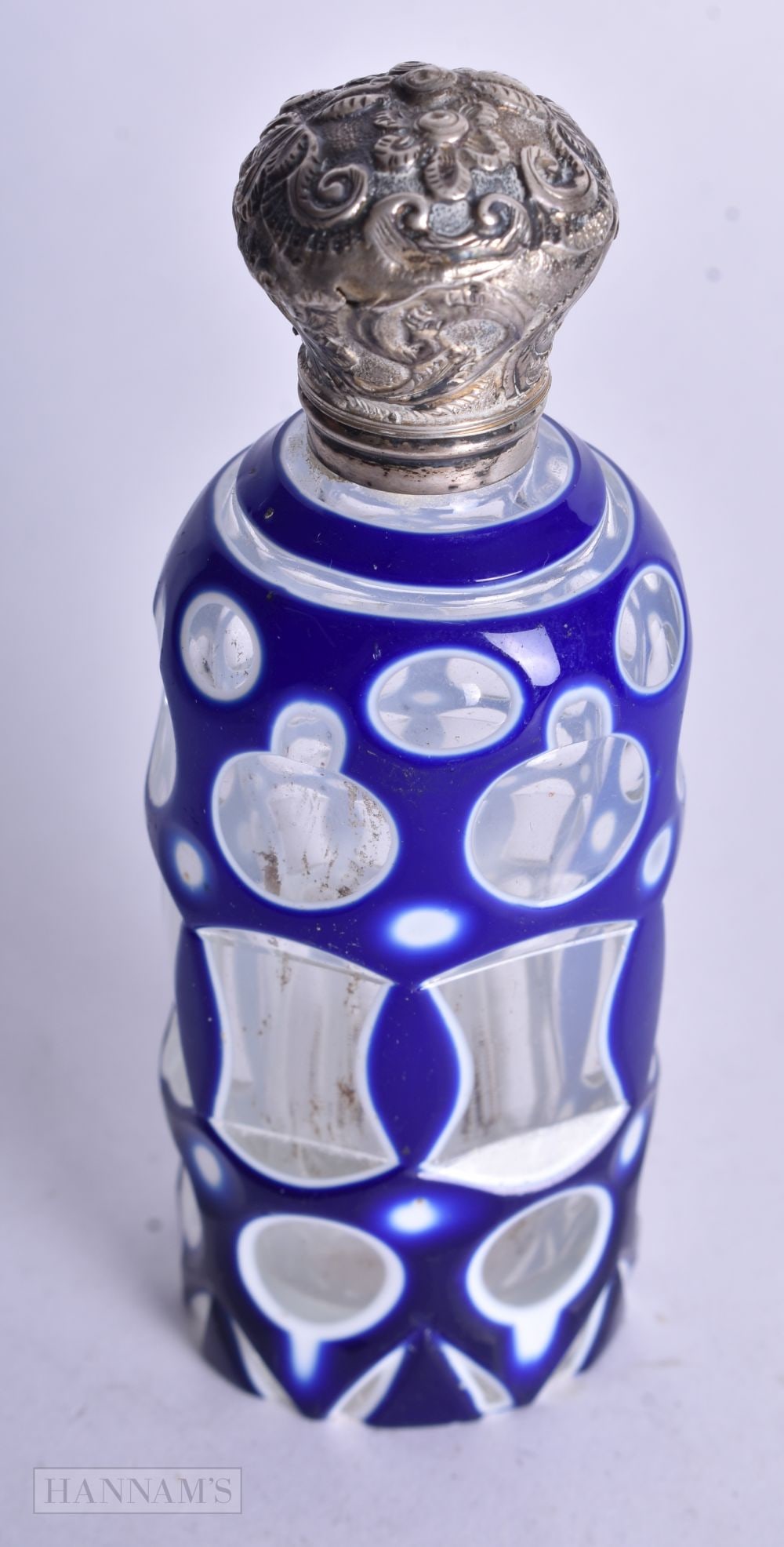 A VICTORIAN SILVER AND BLUE FLASH GLASS SCENT BOTTLE. 90.3 grams. 10 cm high. (1 of 4)