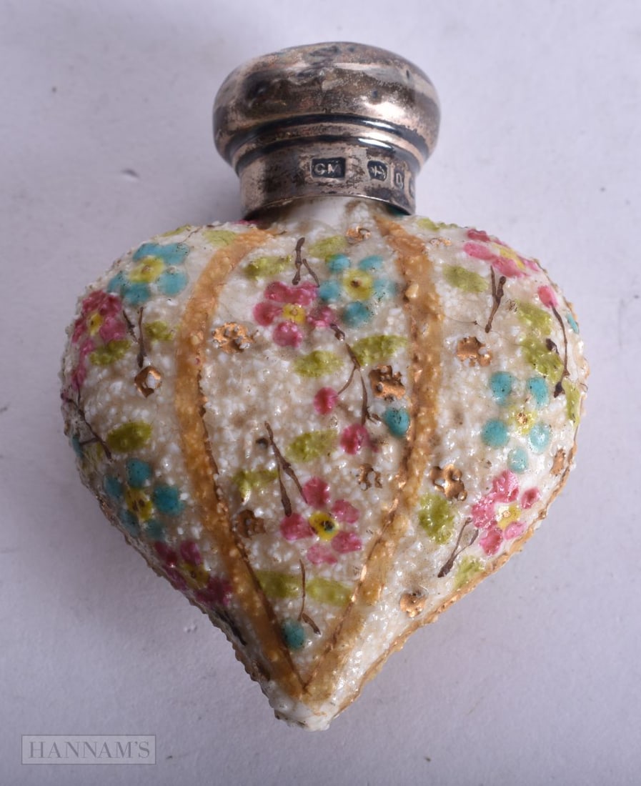 A VICTORIAN SILVER AND PORCELAIN SCENT BOTTLE. Birmingham 1888. 24.5 grams. 6 cm x 4.5 cm. (1 of 3)