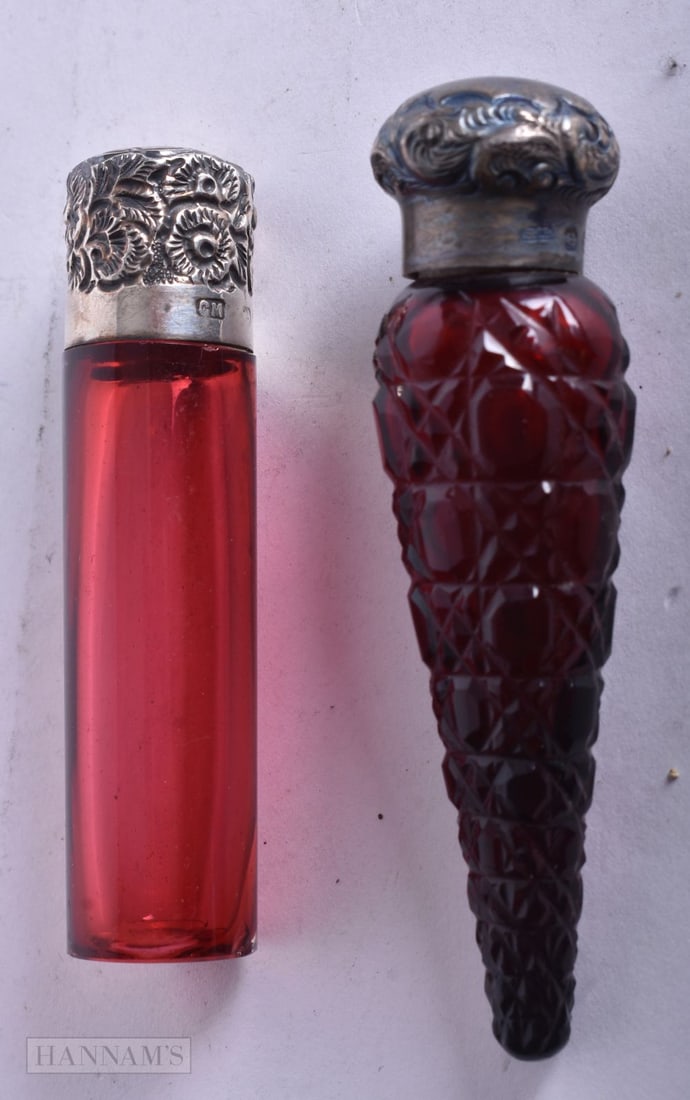 TWO VICTORIAN SILVER AND RUBY GLASS SCENT BOTTLES. 44.7 grams. 8 cm long. (2) (1 of 4)