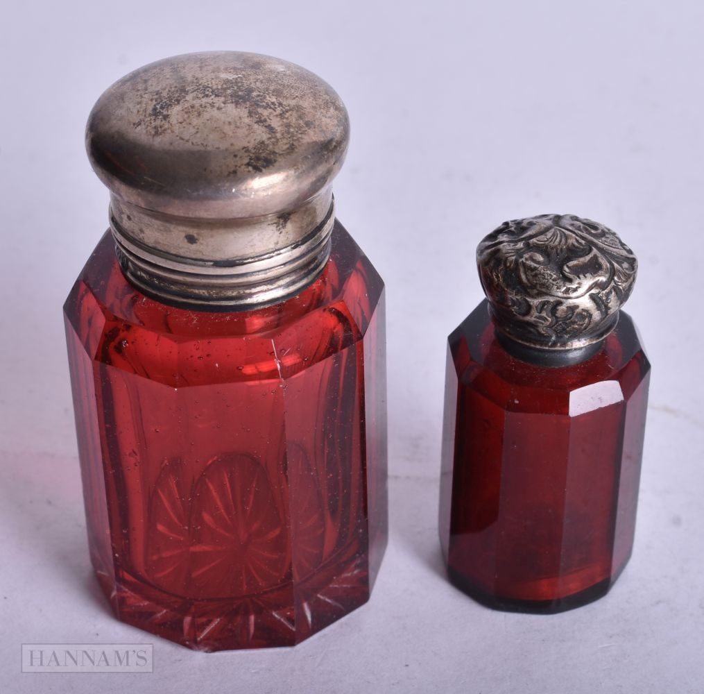 TWO VICTORIAN SILVER RUBY GLASS SCENT BOTTLES. 135 grams. 7 cm x 3.5 cm. (2) (1 of 3)