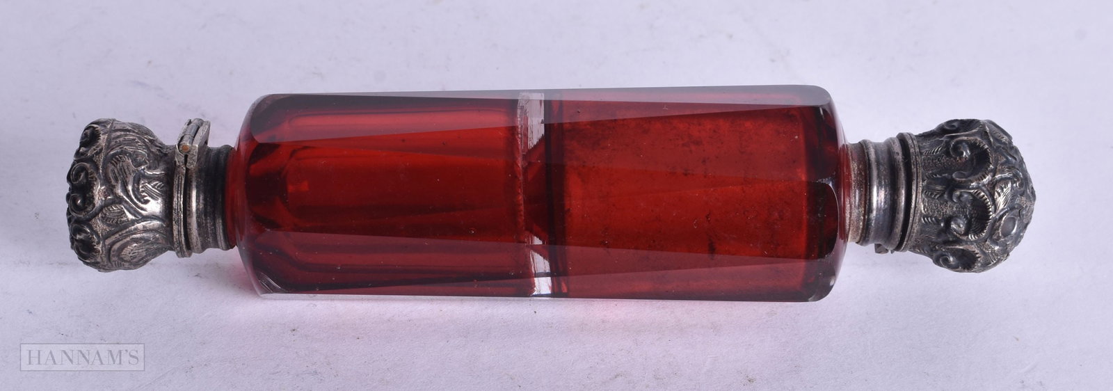 A VICTORIAN SILVER AND RUBY GLASS SCENT BOTTLE. 111 grams. 13 cm long. (1 of 3)